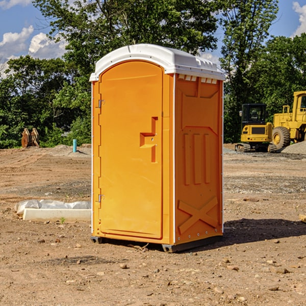 how often are the portable restrooms cleaned and serviced during a rental period in East Douglas